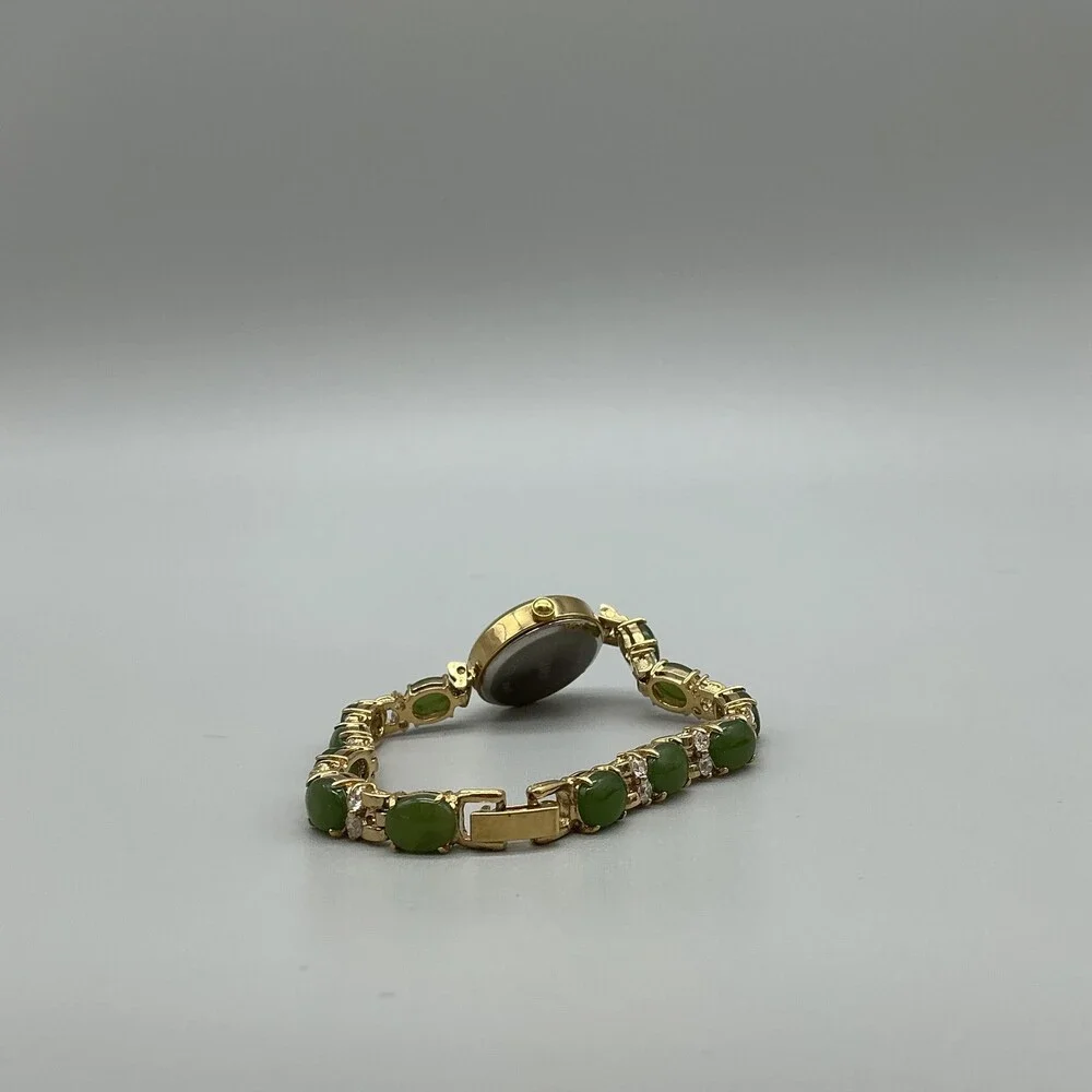 HMI Womens Watch 22mm MOP Gold Tone Green Stone Bracelet New Battery 7.25